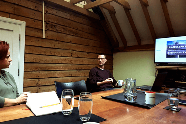 2 people in a meeting