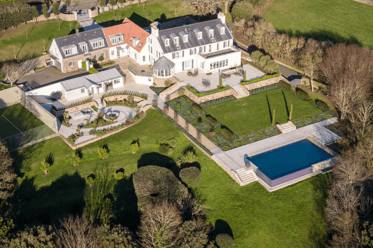 le val lodge ariel view including the pool and balcony