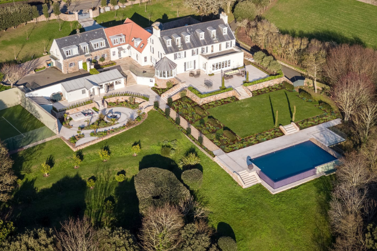 Aerial landscaped garden with pool